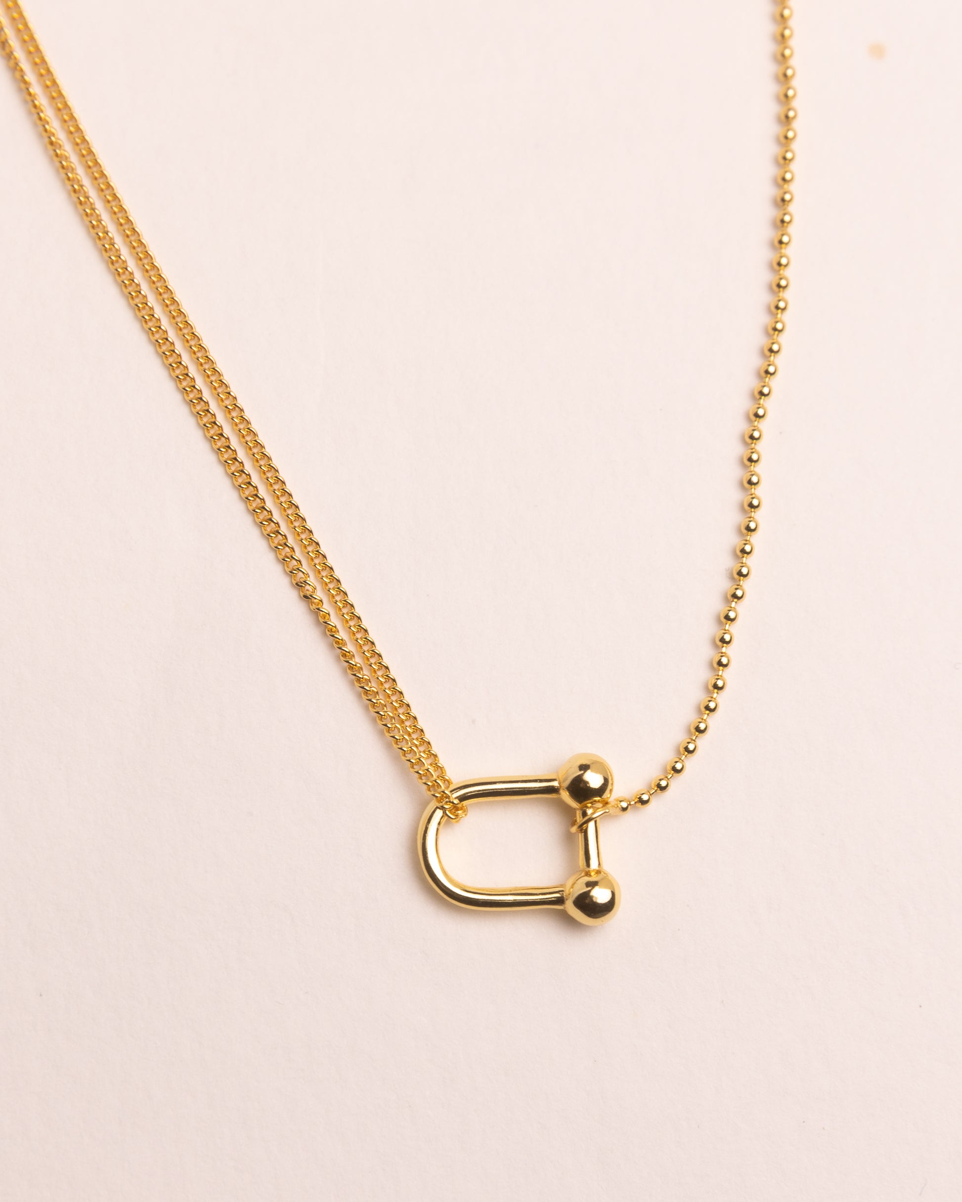 STIRRUP PENDANT NECKLACE